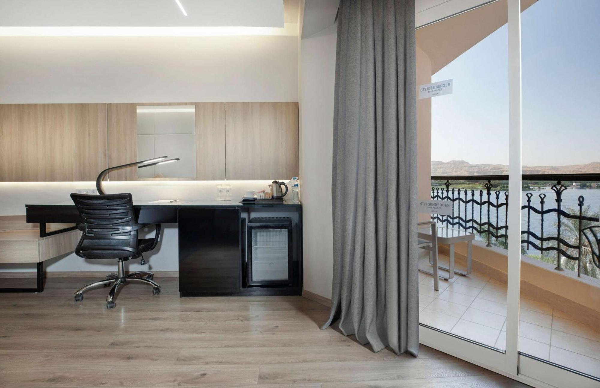 สไตเกนเบร์เกอร์ ไนล์ พาเลซ Hotel ลักซอร์ ภายนอก รูปภาพ The interior of a typical apartment